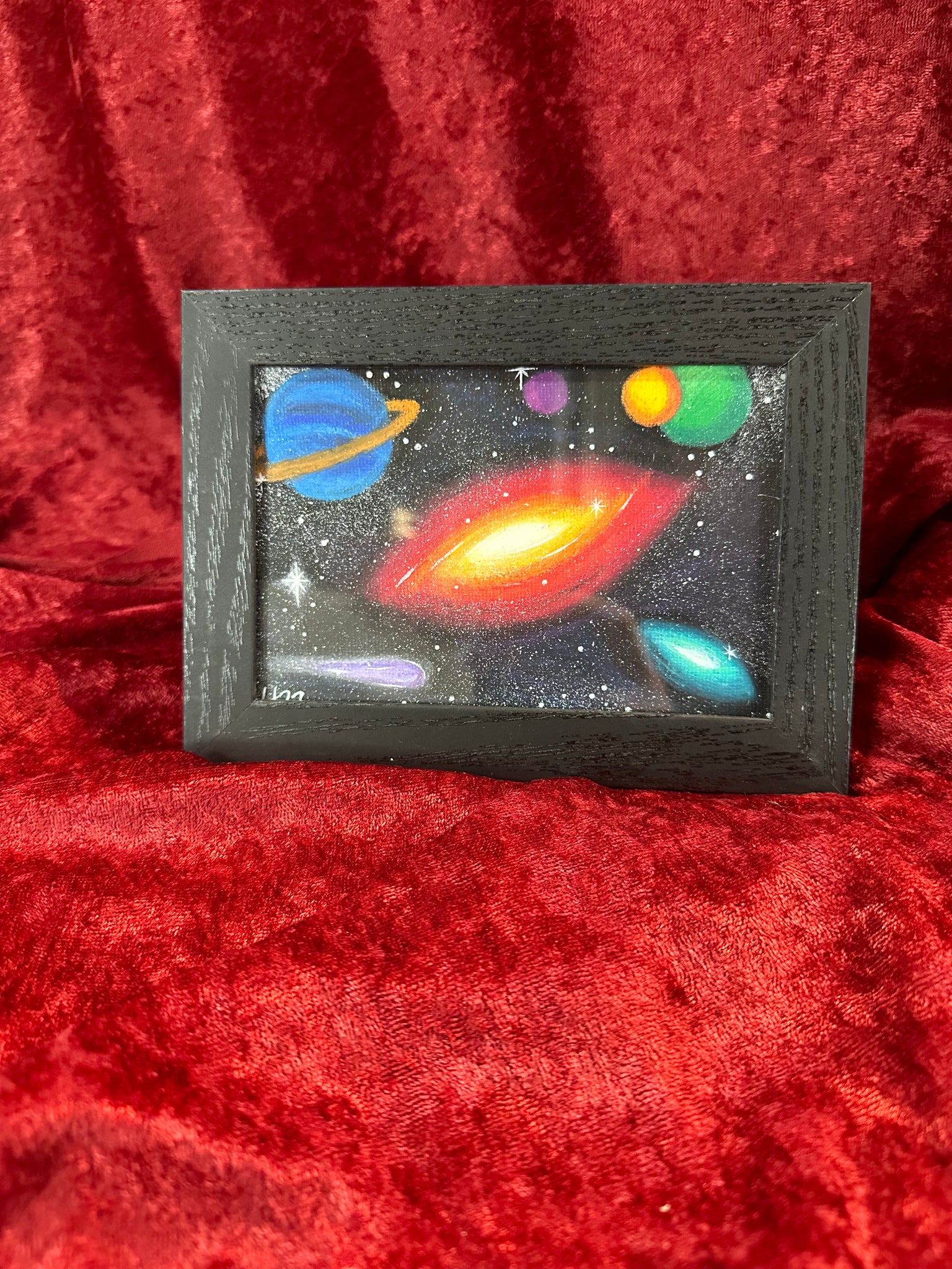 Framed oil pastel artwork