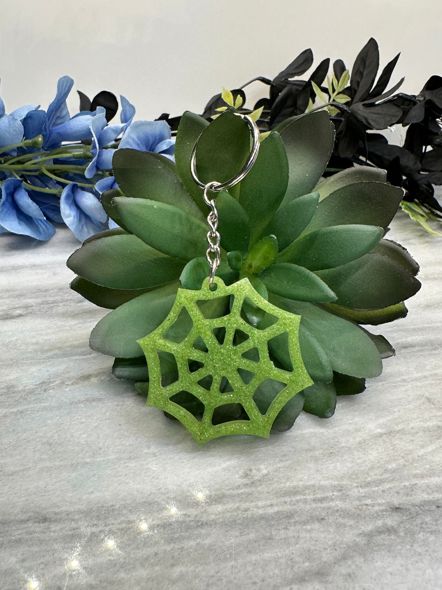 Web resin cast keychain